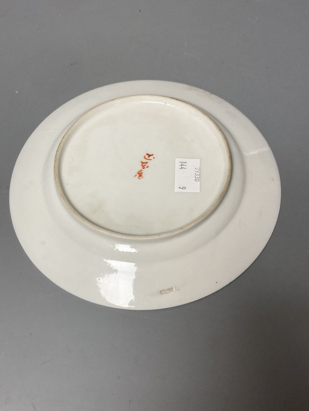 Two Japanese plates, a cloisonne vase and a seal paste box, largest 24.5cm